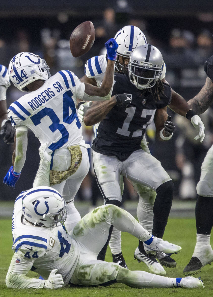 A pass intended for Raiders wide receiver Davante Adams (17) is deflected by Indianapolis Colts ...