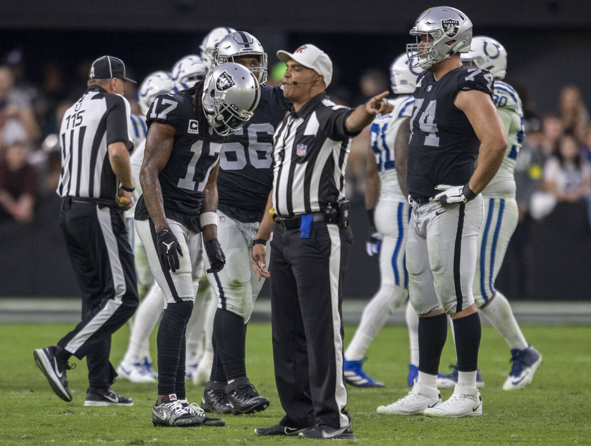 Raiders wide receiver Davante Adams (17) reacts after a penalty is called on him during the sec ...