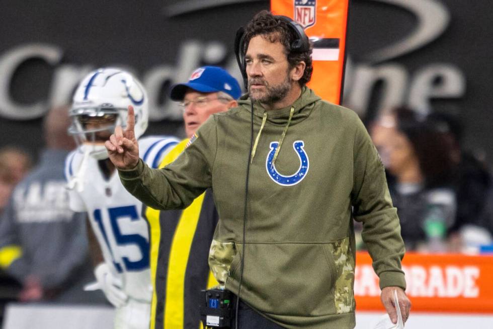 Indianapolis Colts head coach Jeff Saturday communicates to the team from the sideline during t ...