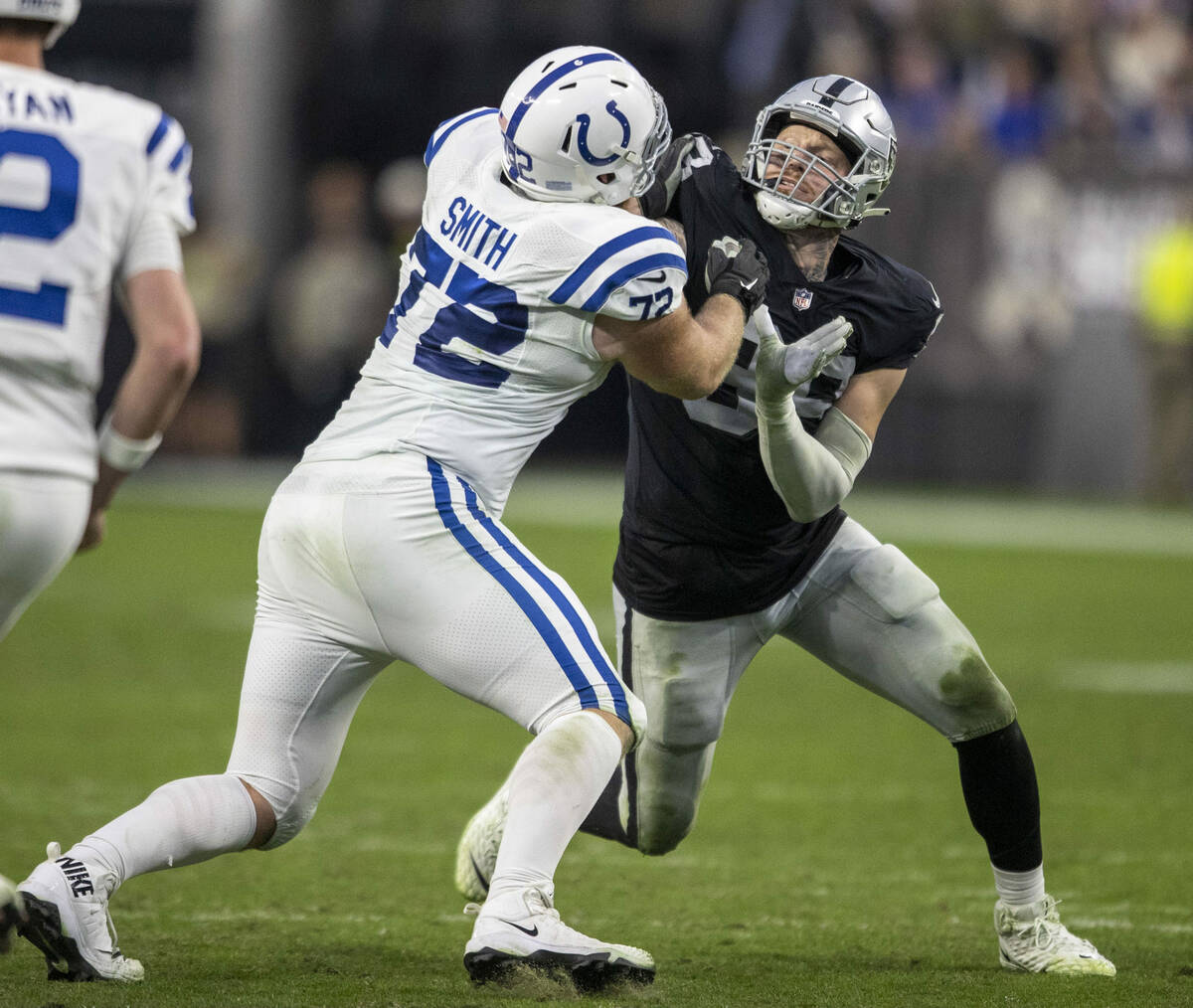 Las Vegas Raiders defensive end Maxx Crosby (98) defends against Indianapolis Colts offensive t ...