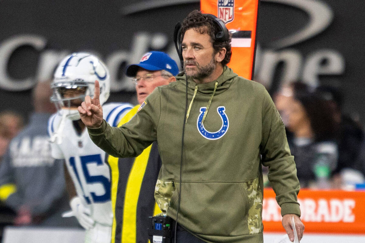 Indianapolis Colts head coach Jeff Saturday communicates to the team from the sideline during t ...