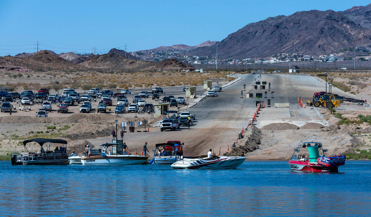 Boats line up to launch and be taken out on Labor Day at Hemenway Harbor at Lake Mead National ...