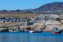 Boats line up to launch and be taken out on Labor Day at Hemenway Harbor at Lake Mead National ...