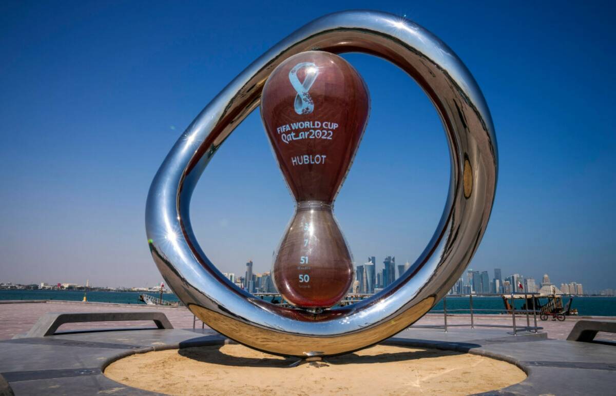 The official FIFA World Cup Countdown Clock on Doha's corniche, overlooking the skyline of Doha ...