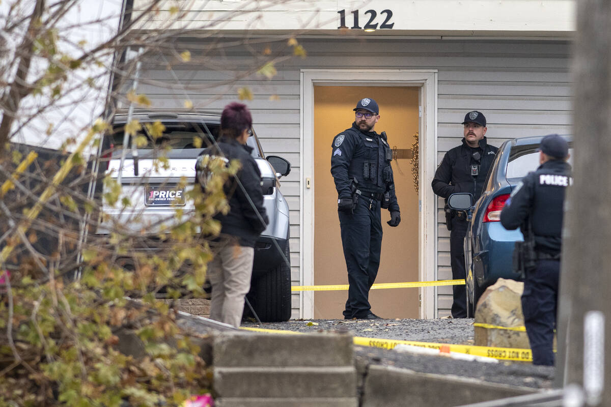 Officers investigate a homicide at an apartment complex south of the University of Idaho campus ...