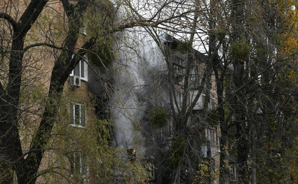 A damaged building seen at the scene of Russian shelling in Kyiv, Ukraine, Tuesday, Nov. 15, 20 ...