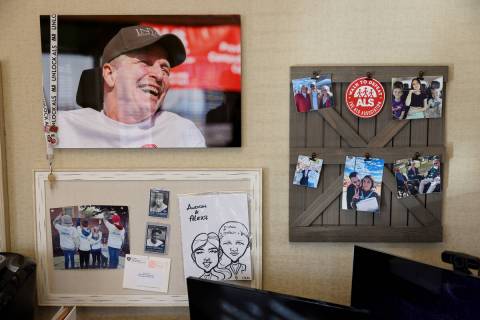 Photos, a lanyard and pins on the wall of ALS Association of Nevada office in Las Vegas Tuesday ...