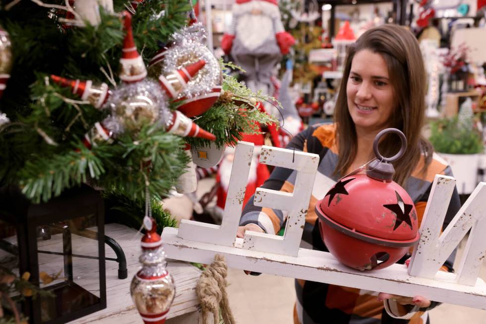 Katey James of Henderson shops at Santa’s Wrap home decor and furniture store in Las Vegas Th ...
