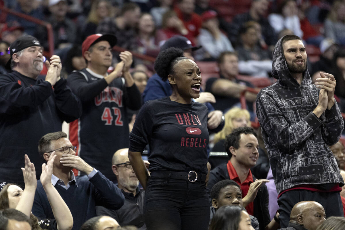 UNLV Rebels fans go wild for their team as they are beating the No. 21 ranked Dayton Flyers dur ...