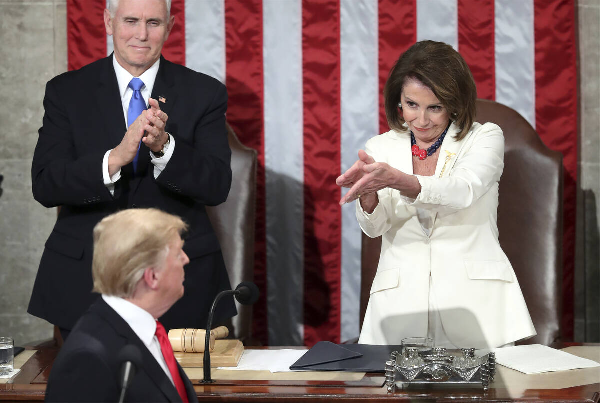 FILE - President Donald Trump turns to House Speaker Nancy Pelosi of Calif., as he delivers his ...