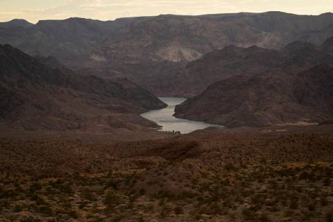 FILE - Water flows down the Colorado River downriver from Hoover Dam in northwest Arizona, on A ...
