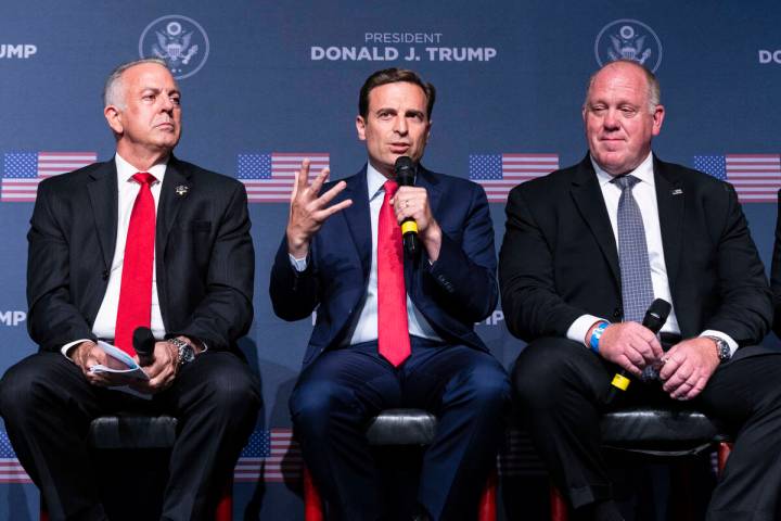 Former Nevada Attorney General Adam Laxalt, center, speaks as Clark County Sheriff Joe Lombardo ...