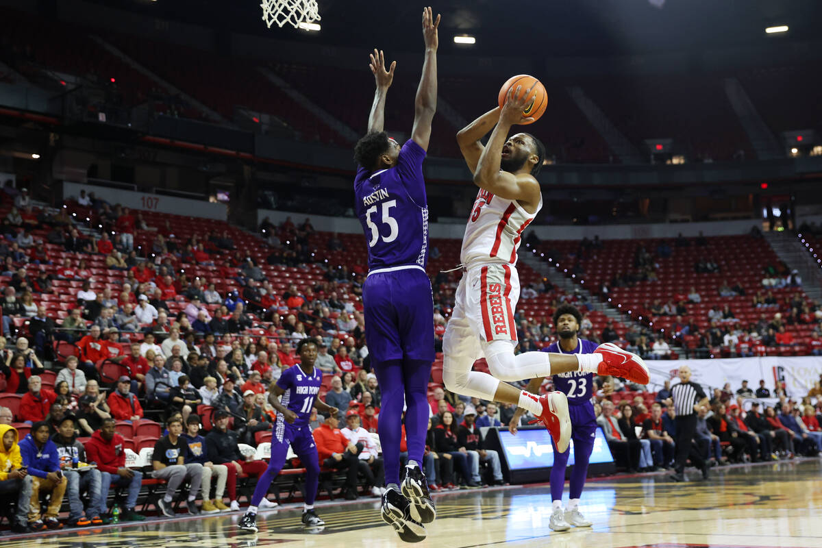 UNLV Rebels guard EJ Harkless (55) goes up for a shot against High Point Panthers forward Zack ...