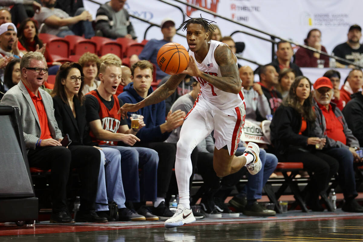 UNLV Rebels guard Elijah Parquet (1) steps out of bounds after stealing the ball from the High ...