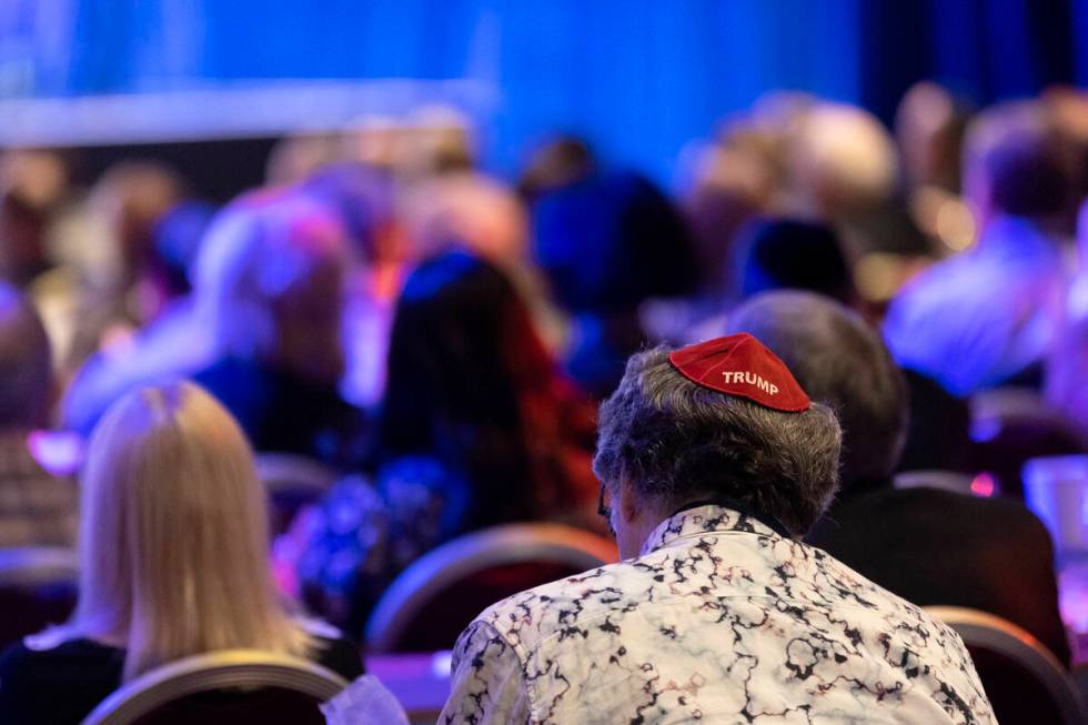 Audience members, one wearing a Trump yarmulke, listen to speakers during the annual Republican ...