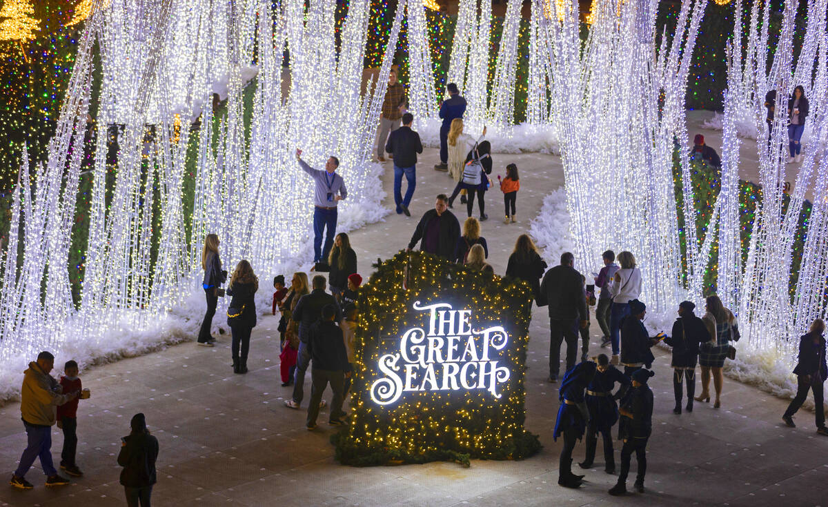 Attendees explore Enchant Christmas at Las Vegas Ballpark on Tuesday, Nov. 30, 2021, in Las Veg ...