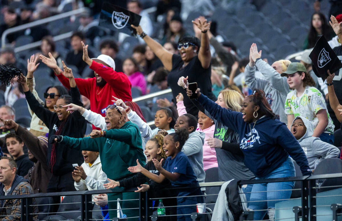 SLAM Academy fans celebrate a score over Truckee during the second half of their 3A state champ ...