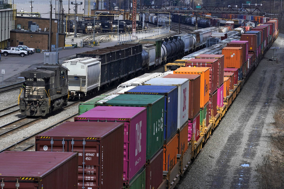 This April 2, 2021, file photo shows freight train cars and containers at Norfolk Southern Rail ...