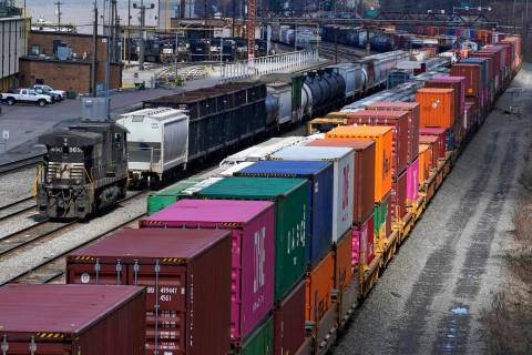 This April 2, 2021, file photo shows freight train cars and containers at Norfolk Southern Rail ...