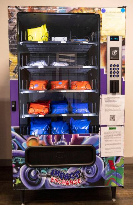 A new public health vending machine is displayed, as part of an innovative intervention program ...