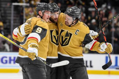 Vegas Golden Knights center Jack Eichel (9) and right wing Mark Stone, right, celebrate defense ...