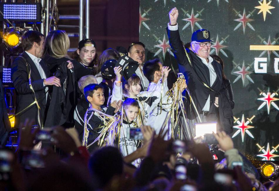 Golden Knights owner Bill Foley, right, celebrates at the conclusion of a ceremony to unveil th ...