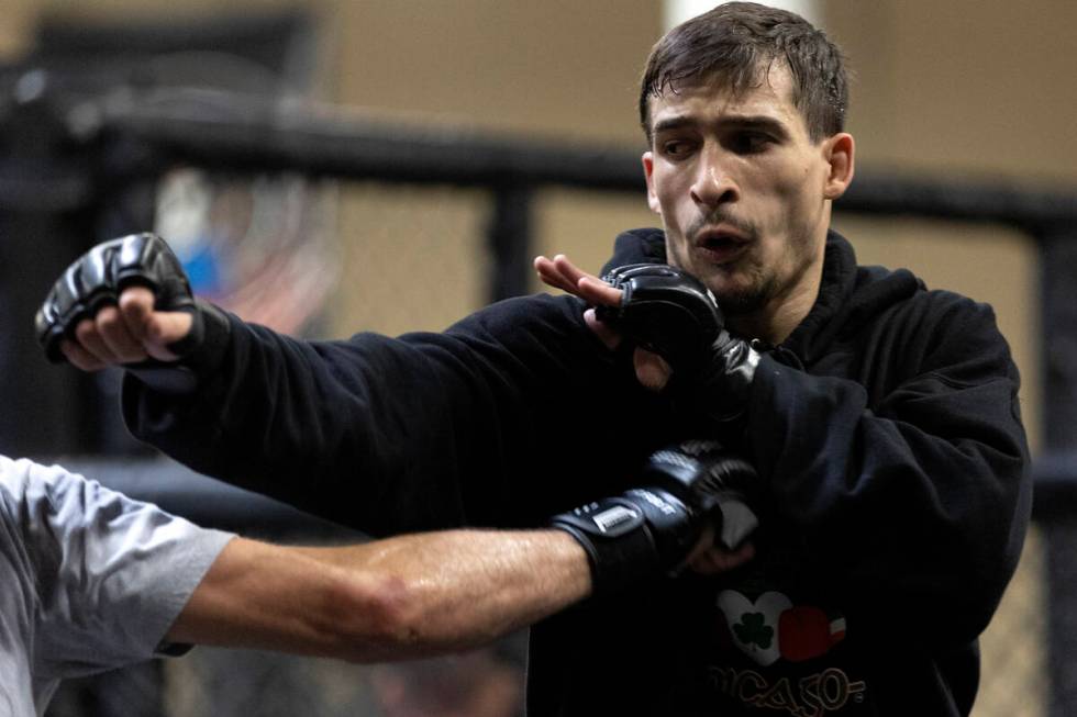 MMA fighter Biaggio Ali Walsh, grandson of legendary boxer Muhammad Ali, spars during training ...