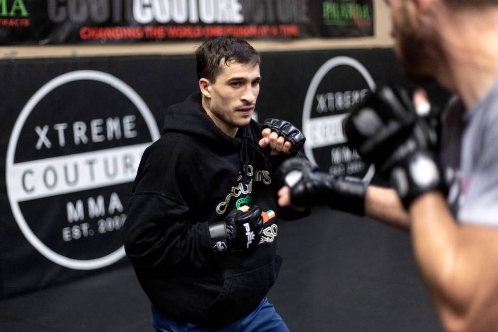 MMA fighter Biaggio Ali Walsh, grandson of legendary boxer Muhammad Ali, spars during training ...