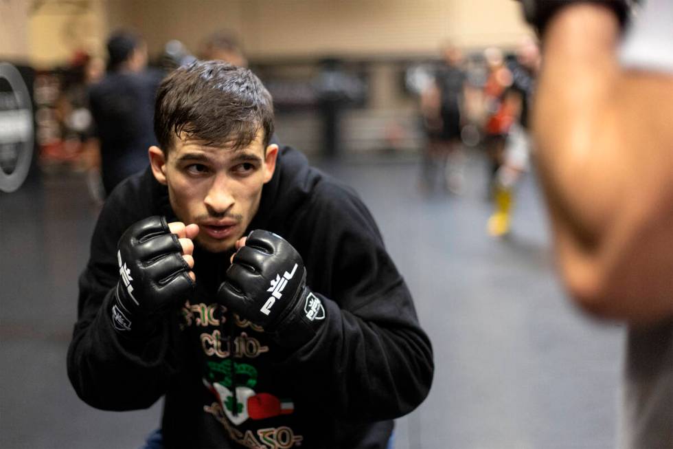 MMA fighter Biaggio Ali Walsh, grandson of legendary boxer Muhammad Ali, spars during training ...