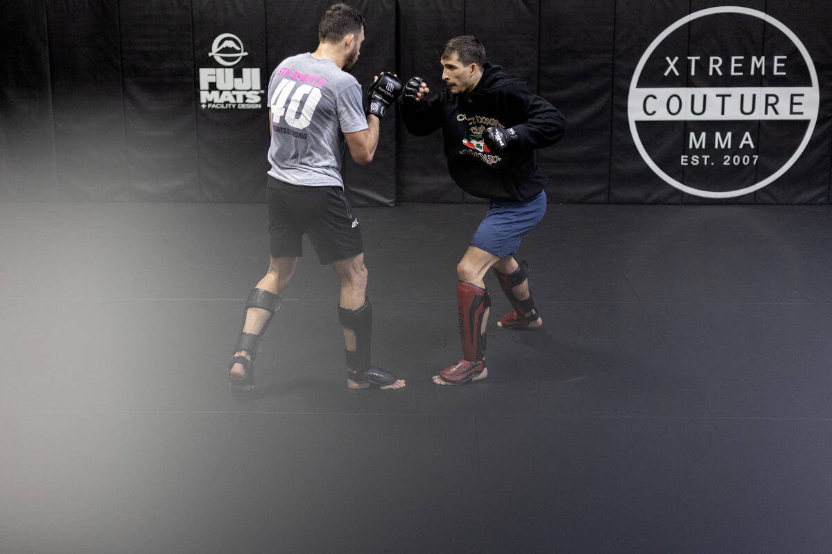 MMA fighter Biaggio Ali Walsh, grandson of legendary boxer Muhammad Ali, spars with featherweig ...