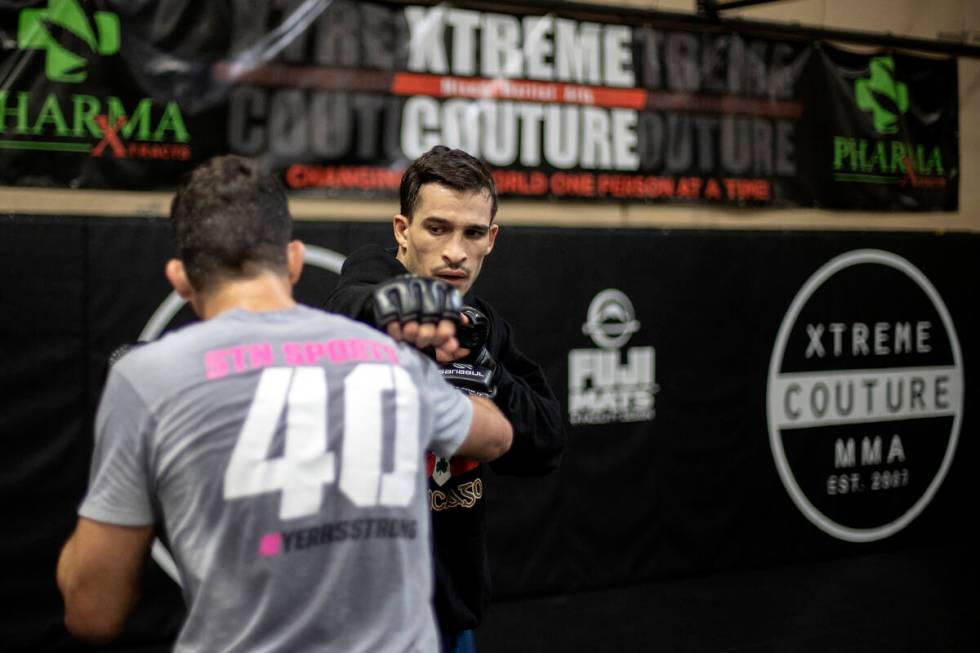 MMA fighter Biaggio Ali Walsh, grandson of legendary boxer Muhammad Ali, spars with featherweig ...