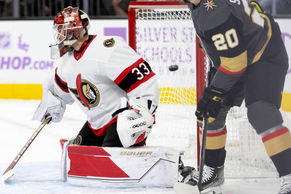 Senators goaltender Cam Talbot (33) misses the save on a shot by Golden Knights right wing Mark ...