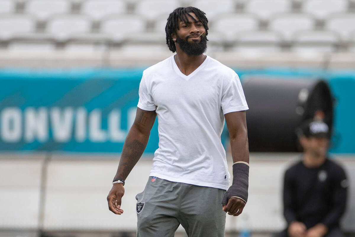 Raiders cornerback Nate Hobbs walks the field before an NFL game against the Jacksonville Jagua ...