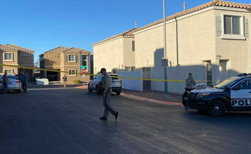 FILE - Las Vegas police investigating a homicide in the 5200 block of Tipper Avenue on Tuesday, ...