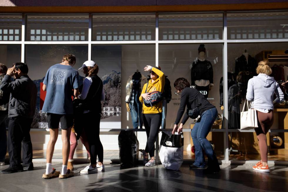 Shoppers wait in line for Black Friday sales at Las Vegas North Premium Outlets on Friday, Nov. ...