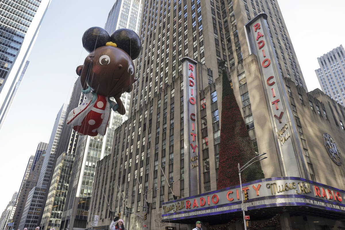 The Ada Twist, Scientist balloon floats past Radio City Music Hall during the Macy's Thanksgivi ...