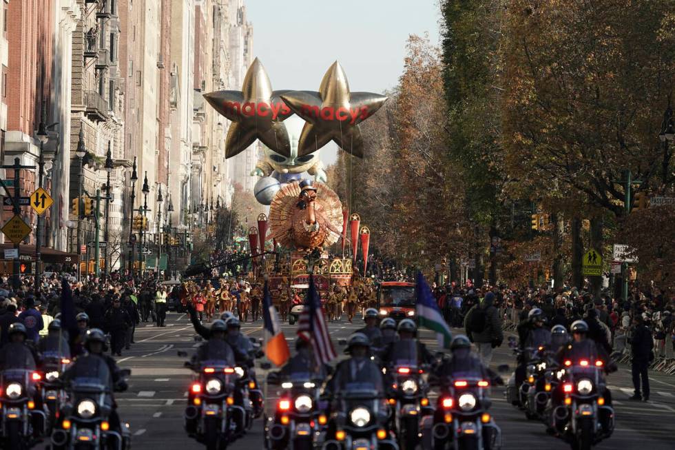 The Tom Turkey float leads the way down Central Park West during the Macy's Thanksgiving Day Pa ...