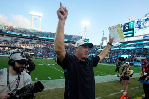 Jacksonville Jaguars head coach Doug Pederson celebrates after winning an NFL football game aga ...