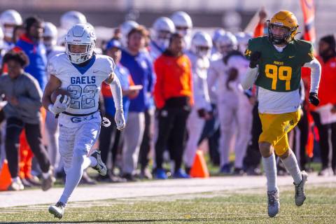 Bishop Gorman RB Micah Kaapana (22) streaks down the sideline for another long touchdown run aw ...