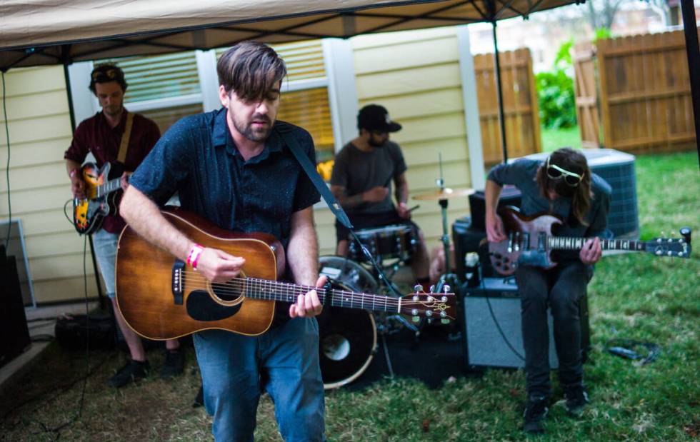 Rusty Maples frontman Blair Dewane performs with the band during a house show in the East Csar ...