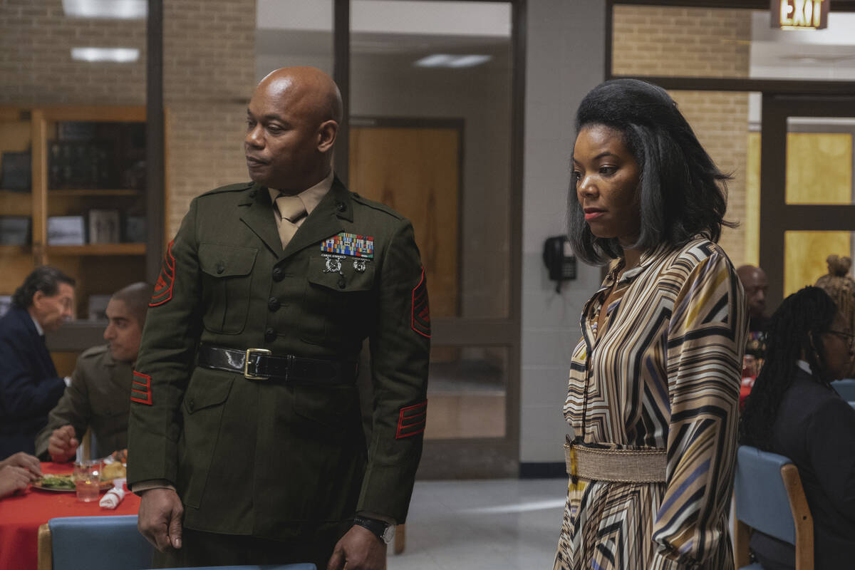 This image released by A24 Films shows Bokeem Woodbine, left, and Gabrielle Union in a scene fr ...