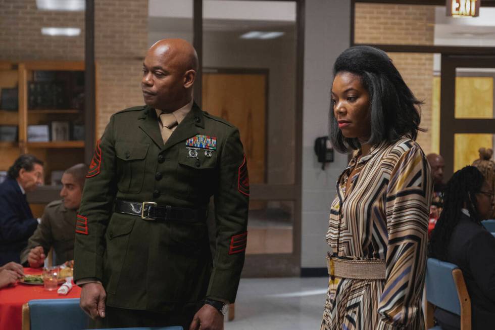 This image released by A24 Films shows Bokeem Woodbine, left, and Gabrielle Union in a scene fr ...