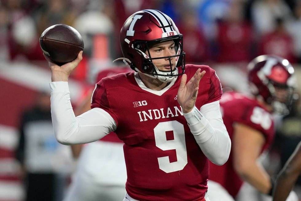 Indiana quarterback Connor Bazelak looks to throw during the second half of an NCAA college foo ...