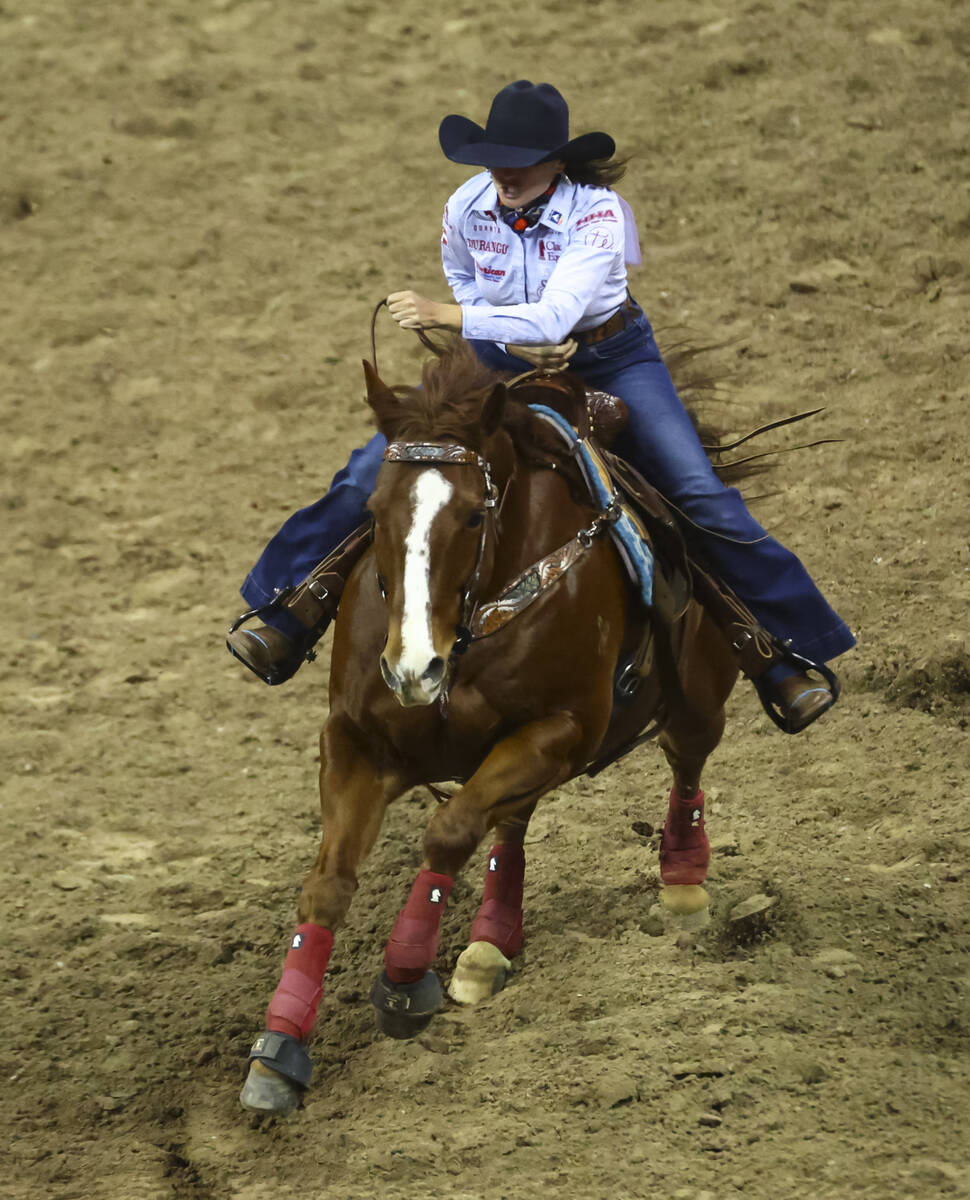 Jordan Briggs, of Tolar, Texas, competes in barrel racing during the first night of the Nationa ...