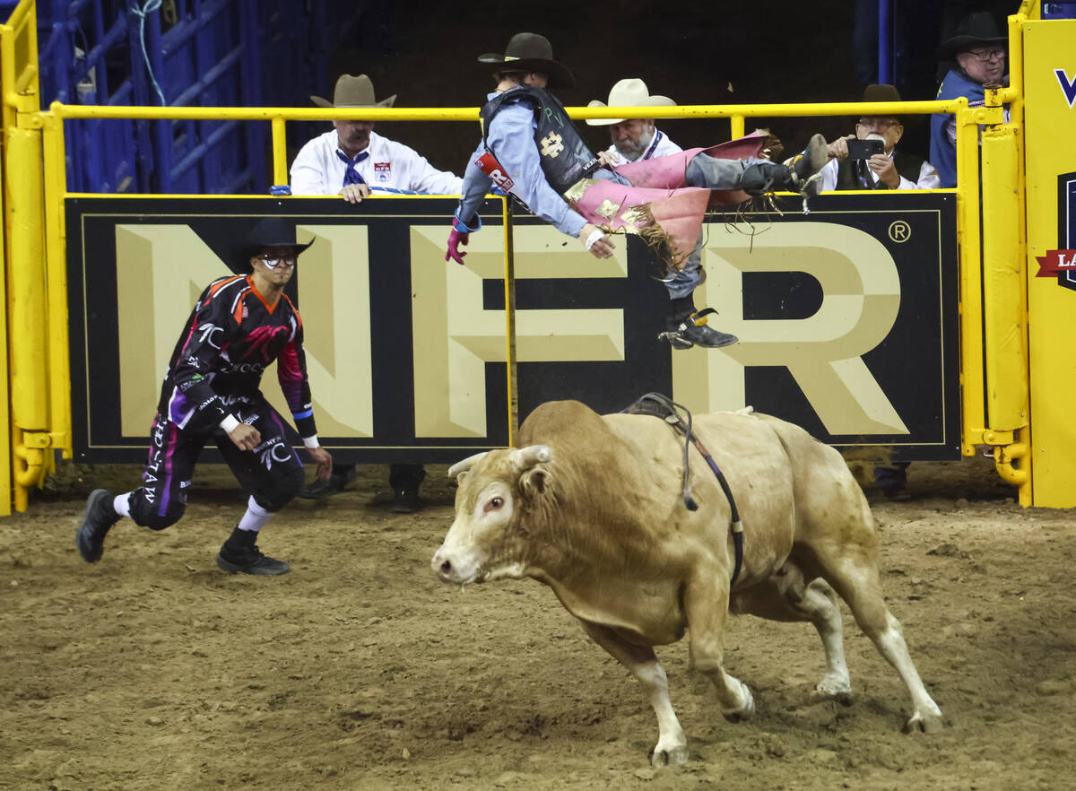 JR Stratford, of Byers, Kan., gets bucked off of Pendleton Punchline while competing in bull ri ...