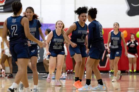 Spring Valley celebrates after their Mia Ervin (1) hit a three-pointer at the halftime buzzer d ...