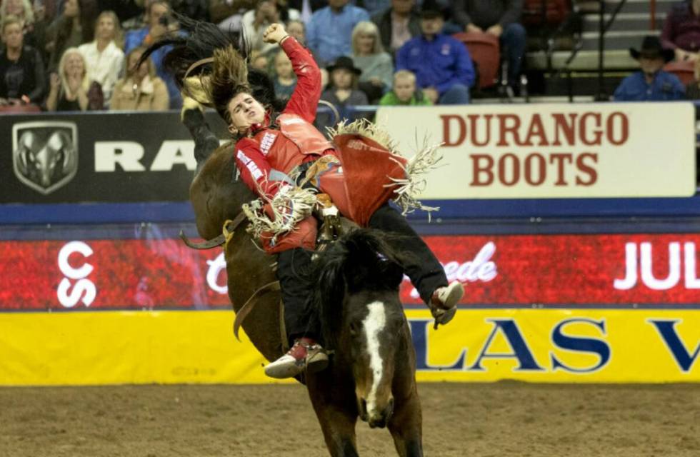 Rocker Steiner, of Weatherford, Texas, competes in bareback riding during the sixth go-round of ...