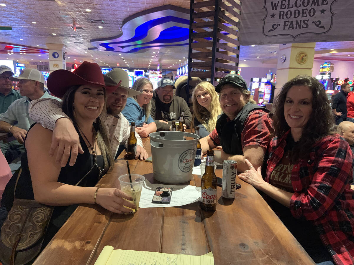 Shelby Hilton, front left, and a group of friends from West Bountiful, Utah, enjoy drinks and a ...