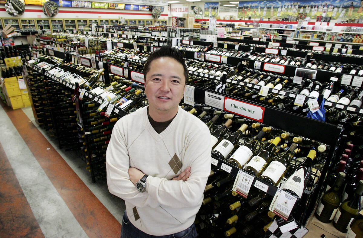 Lee's Discount Liquor owner Kenny Lee stands in one of his store at 1780 S. Rainbow Blvd., in 2 ...