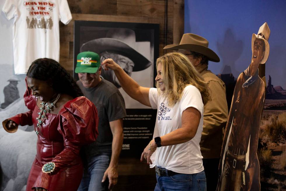 Marisa Wayne, John Wayne’s daughter, second from right, flanked by her brothers Ethan Wa ...